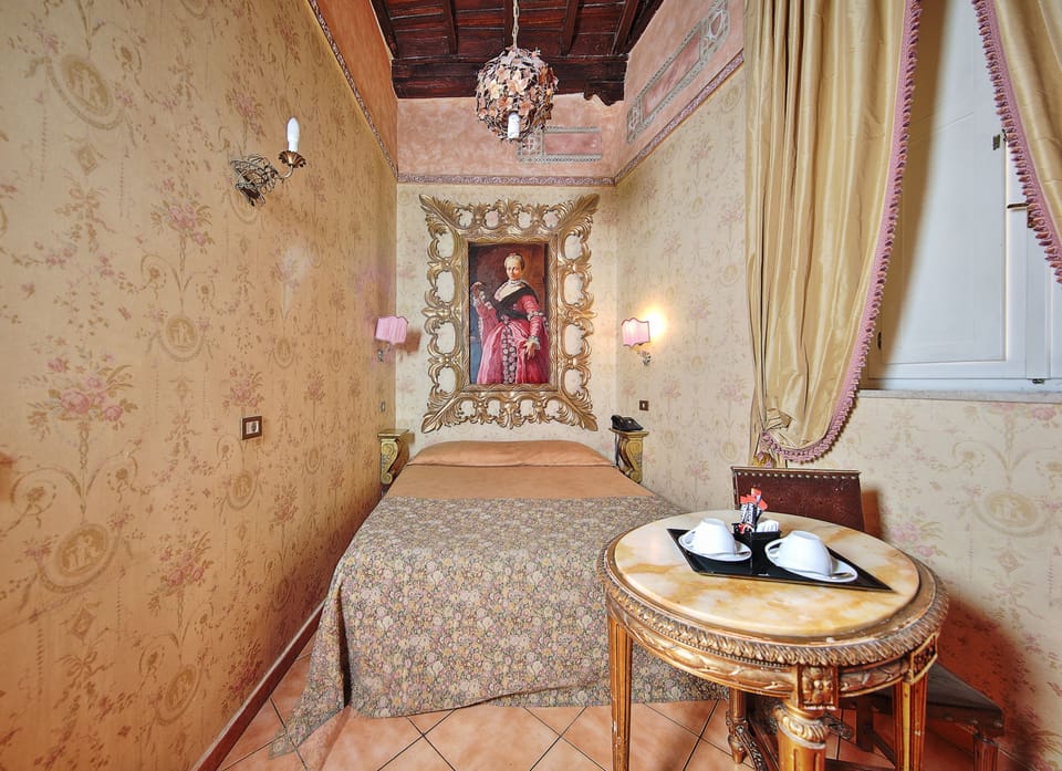 Standard Double Room | Minibar, in-room safe, desk, blackout drapes