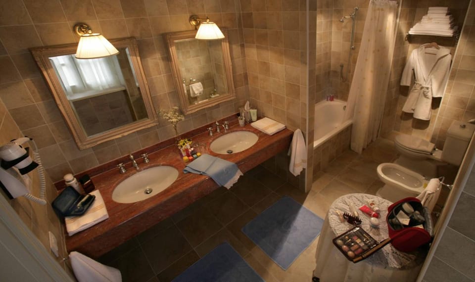 Shower, rainfall showerhead, eco-friendly toiletries, hair dryer