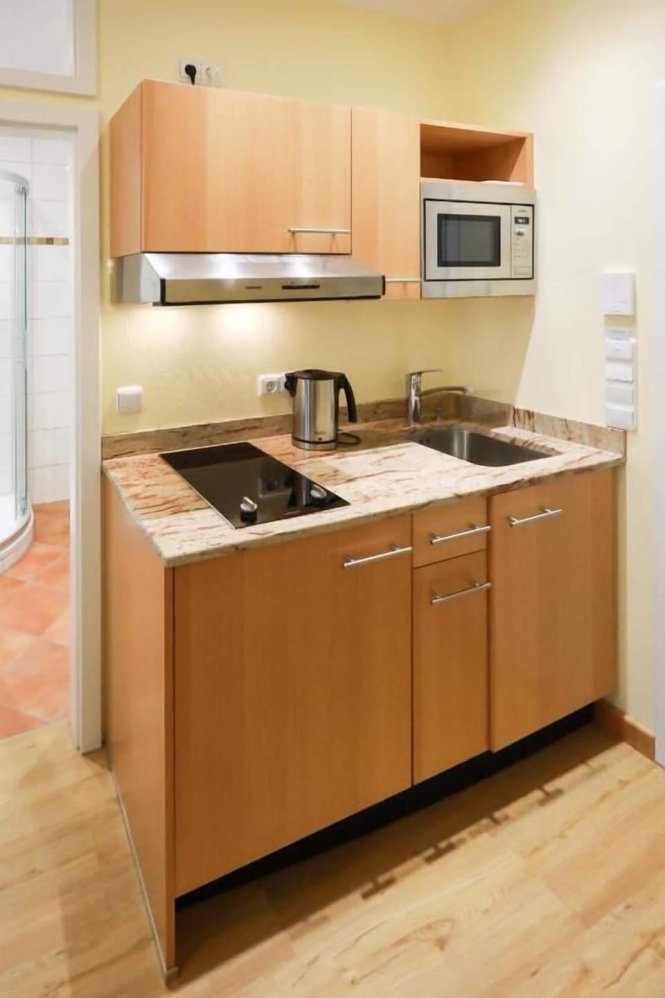 Fridge, microwave, stovetop, cookware/dishes/utensils