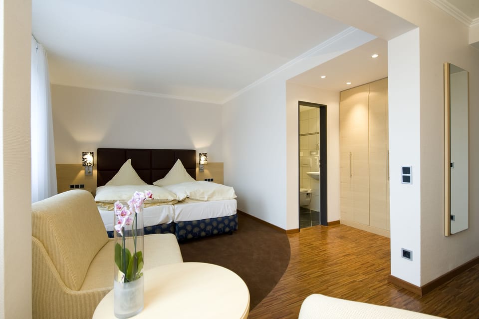 Premium bedding, memory foam beds, minibar, in-room safe