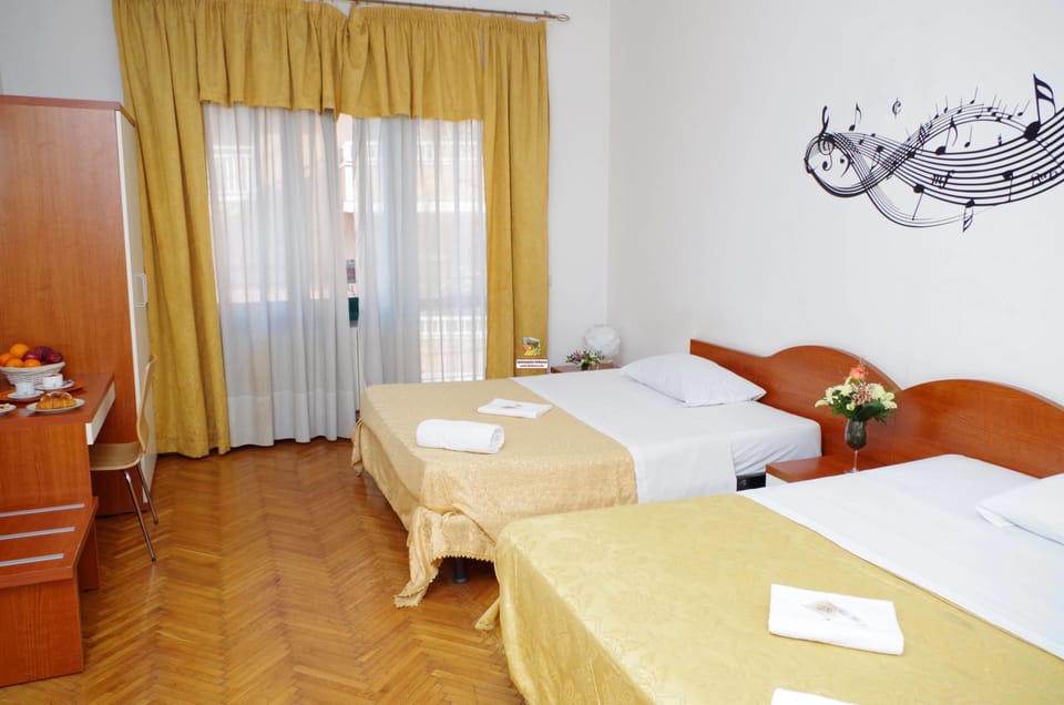 Quadruple Room, Shared Bathroom | Premium bedding, desk, iron/ironing board, rollaway beds