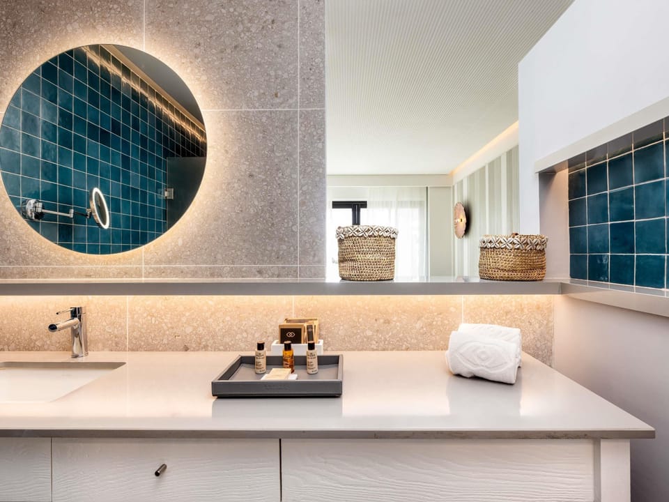 Eco-friendly toiletries, hair dryer, bathrobes, slippers