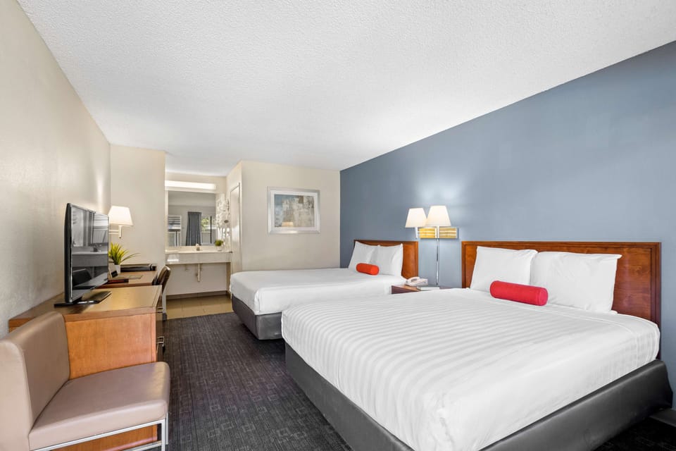 Room, 2 Queen Beds | Desk, iron/ironing board, free WiFi, bed sheets