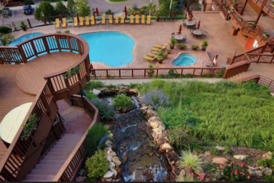 Indoor pool, 2 outdoor pools, open 8:00 AM to 10:00 PM, pool umbrellas