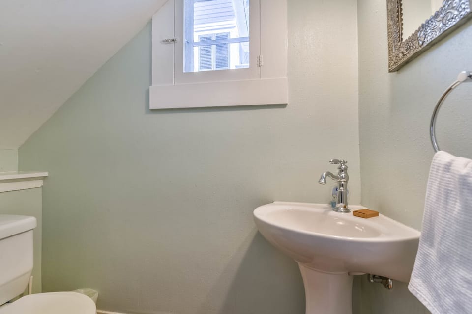 Half bath under stairs downstairs.