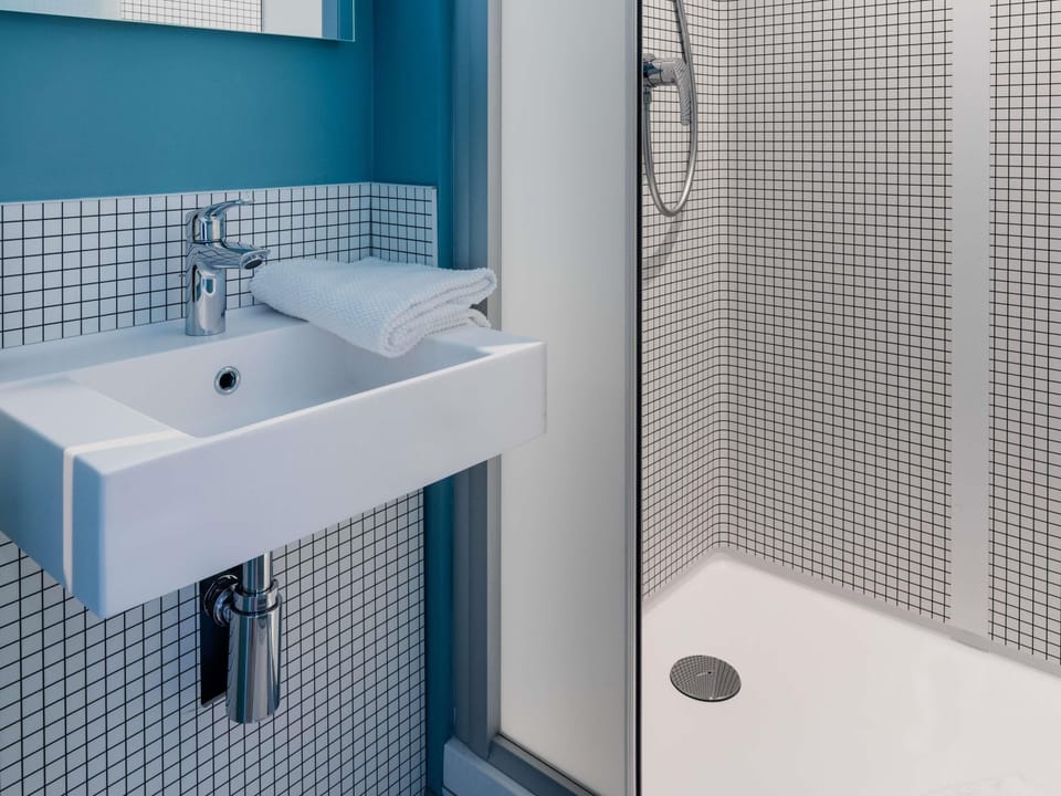 Desk, blackout drapes, soundproofing, iron/ironing board