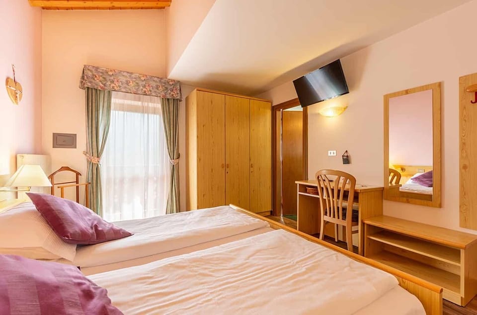 Double or Twin Room | In-room safe, individually decorated, desk, blackout drapes