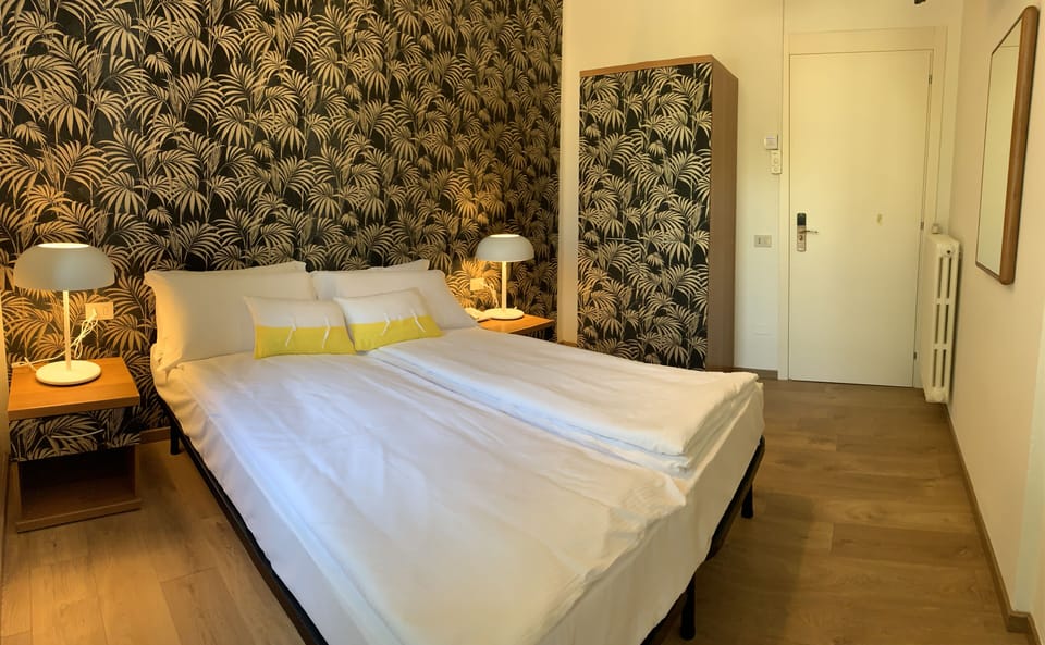 Comfort Room | Down comforters, individually decorated, individually furnished, desk