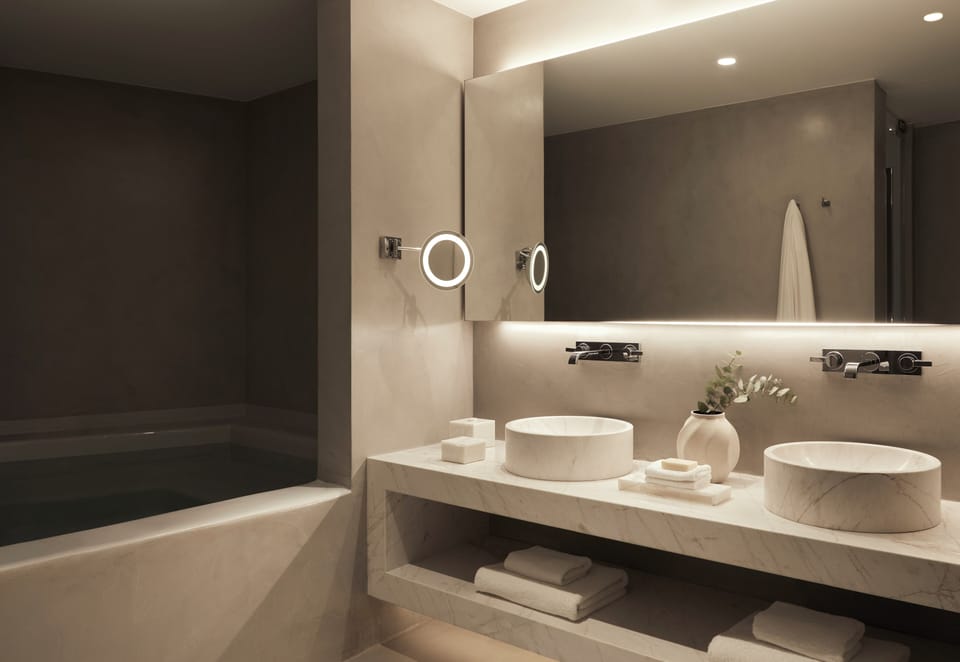 Shower, designer toiletries, hair dryer, bathrobes
