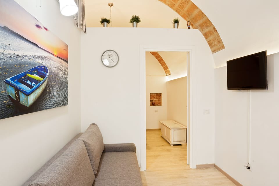 Apartment, 1 Bedroom | Living area | Flat-screen TV