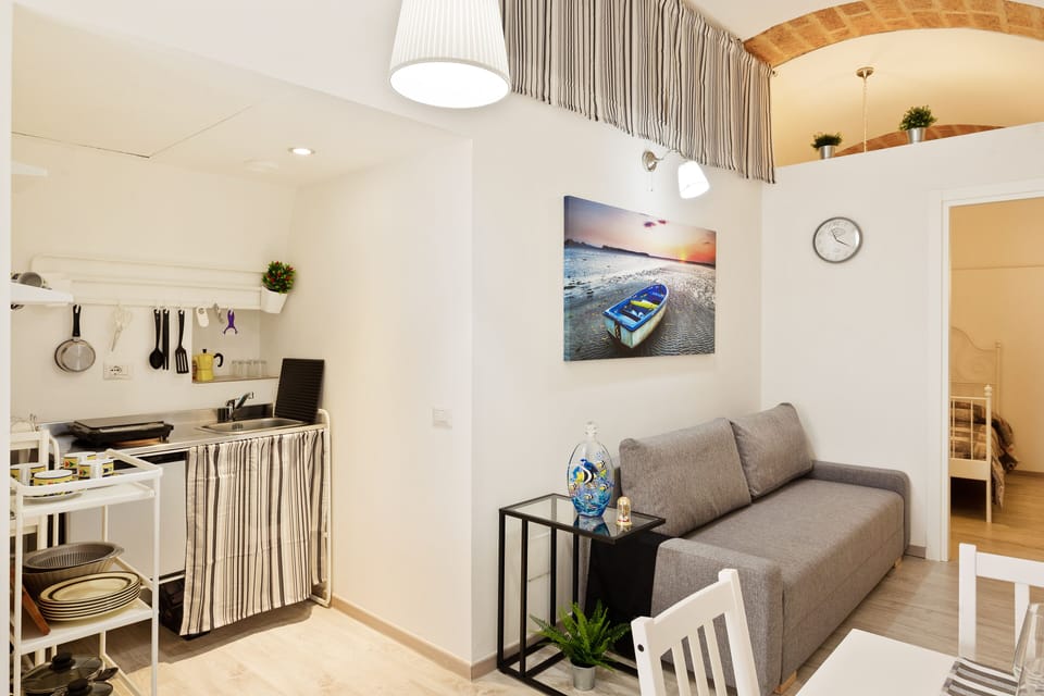 Apartment, 1 Bedroom | Living area | Flat-screen TV