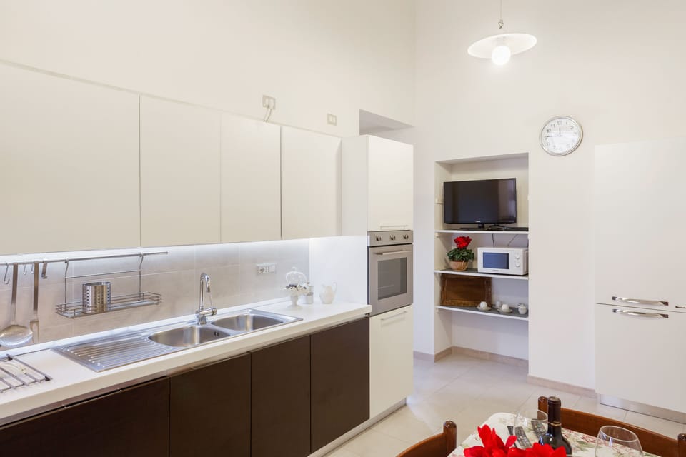 Apartment, 2 Bedrooms | Private kitchen | Full-size fridge, microwave, oven, stovetop