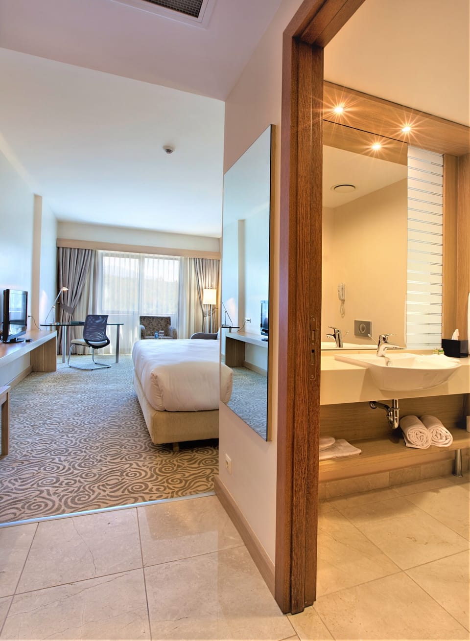 Egyptian cotton sheets, premium bedding, minibar, in-room safe