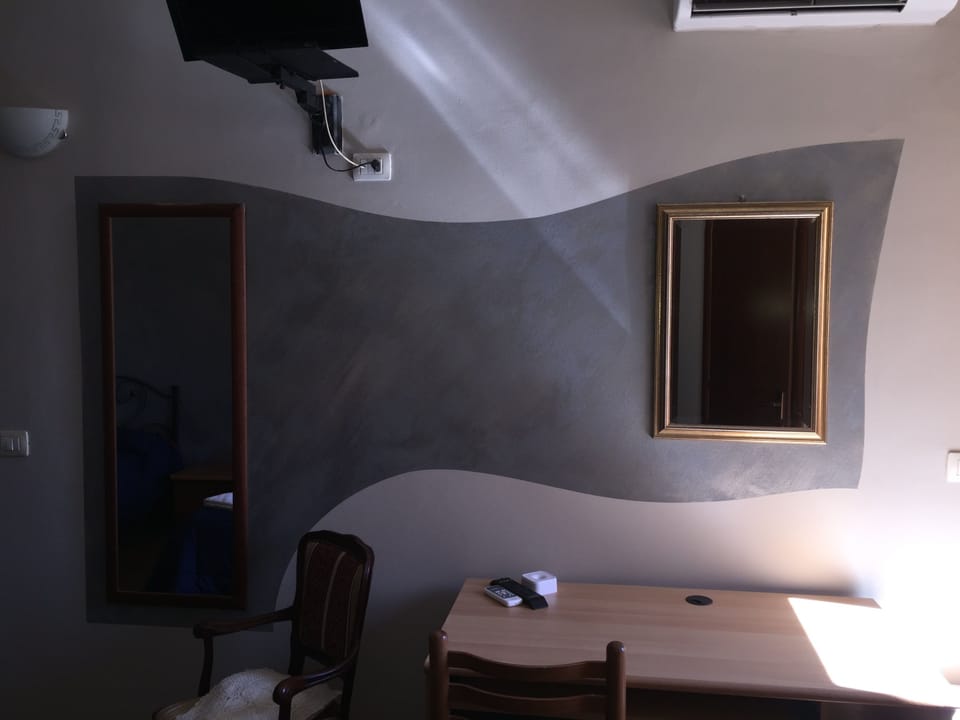 Triple Room | Down comforters, pillowtop beds, individually furnished, desk