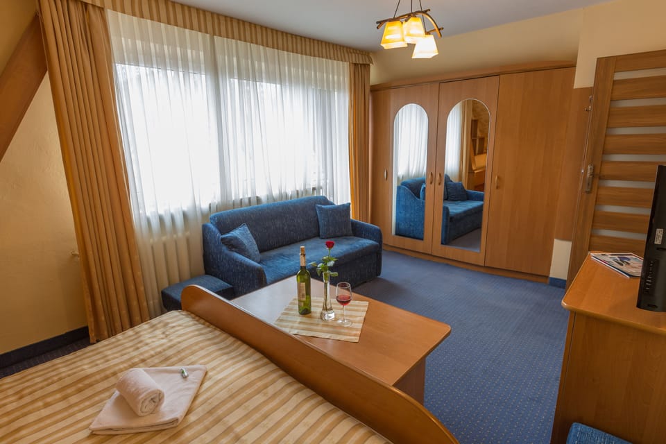 Iron/ironing board (on request), cribs (free), rollaway beds (surcharge)