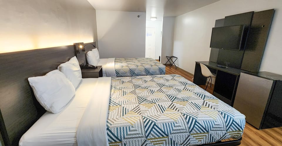 Desk, laptop workspace, WiFi (free), bed sheets