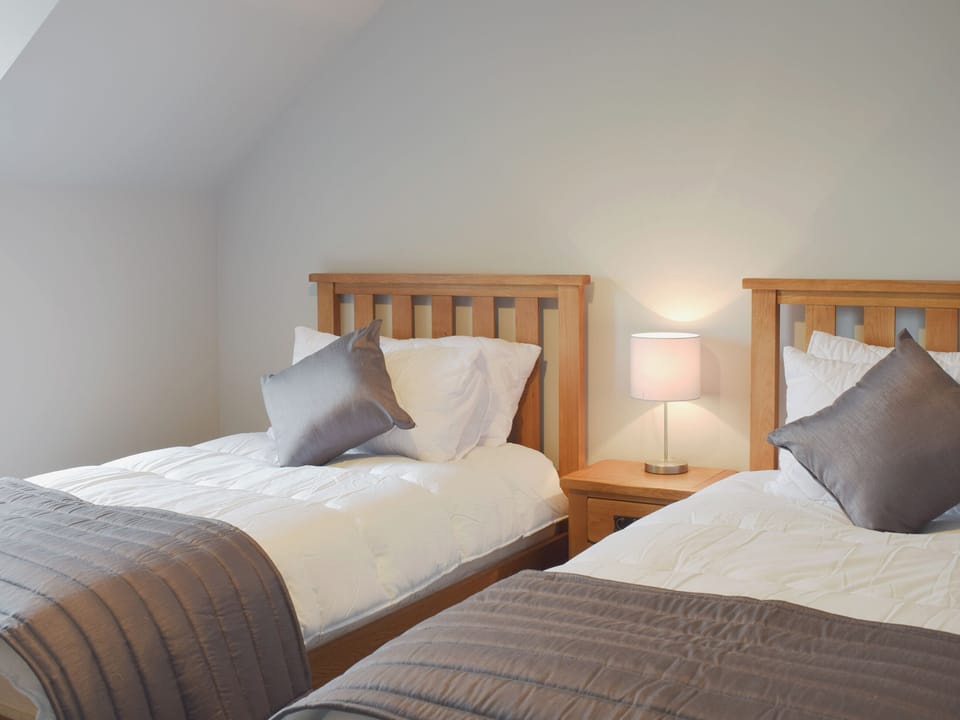 Comfy tiwn bedroom | The School House, New Luce, near Newton Stewart