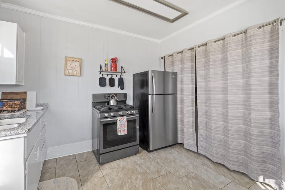 Gas range and full size refrigerator
