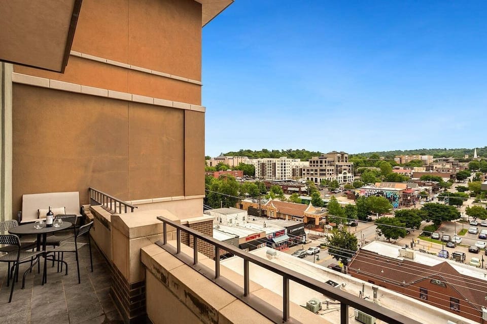 Enjoy a glass of wine or a morning coffee with unbeatable views that overlook Dickson Street, George's Majestic Music Lounge, Fayetteville's Historic Train Depot, the Walton Arts Center, local restaurants, and so much more.
