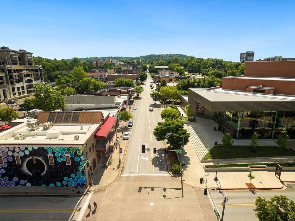 Also, within a minute's walking distance, the newly remodeled Walton Arts center, downtown eating & bars, and our town's famed 'Dickson Street Bookstore'.