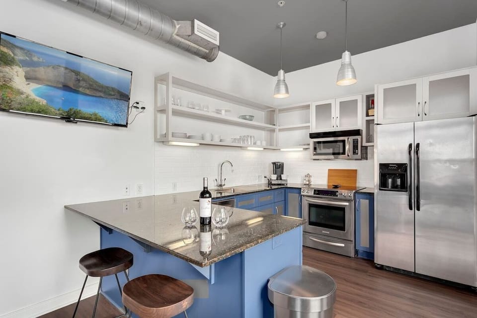 Inside the kitchen, our guests love the ample cooking area, open shelving and top of the line appliances.