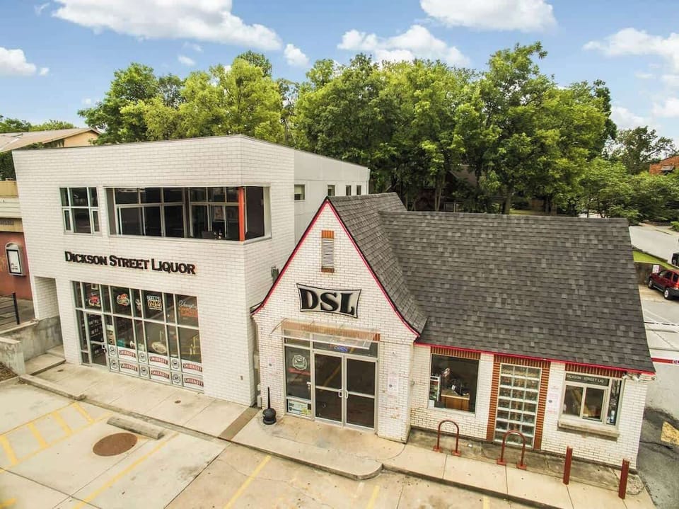 Our place is the patio + condo located directly on top of Dickson Street Liquor, downtowns most beloved shop for spirits, beer, and wines.