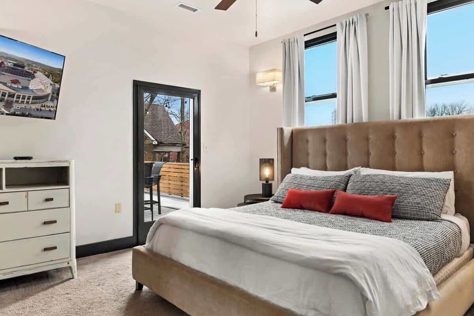 Our home's private master suite features a super cozy King bed, luxury linens, direct access to the back deck, and room darkening curtains so you can sleep in as long as you'd like.