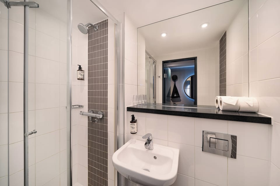 Shower, free toiletries, hair dryer, towels