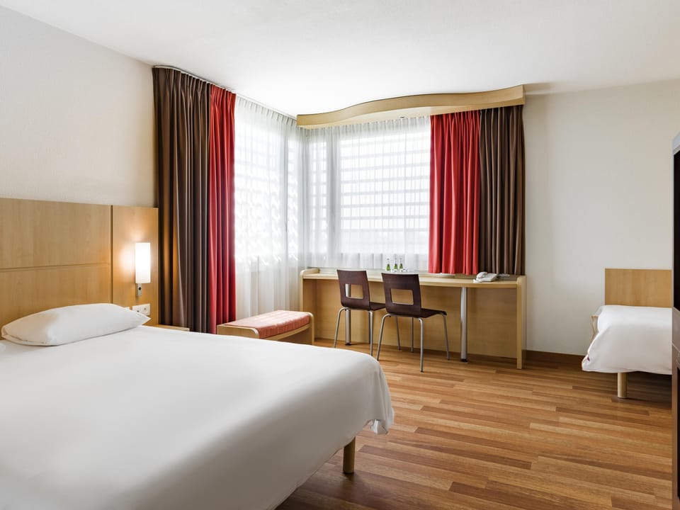 Standard Room, Multiple Beds | In-room safe, desk, soundproofing, free cribs/infant beds