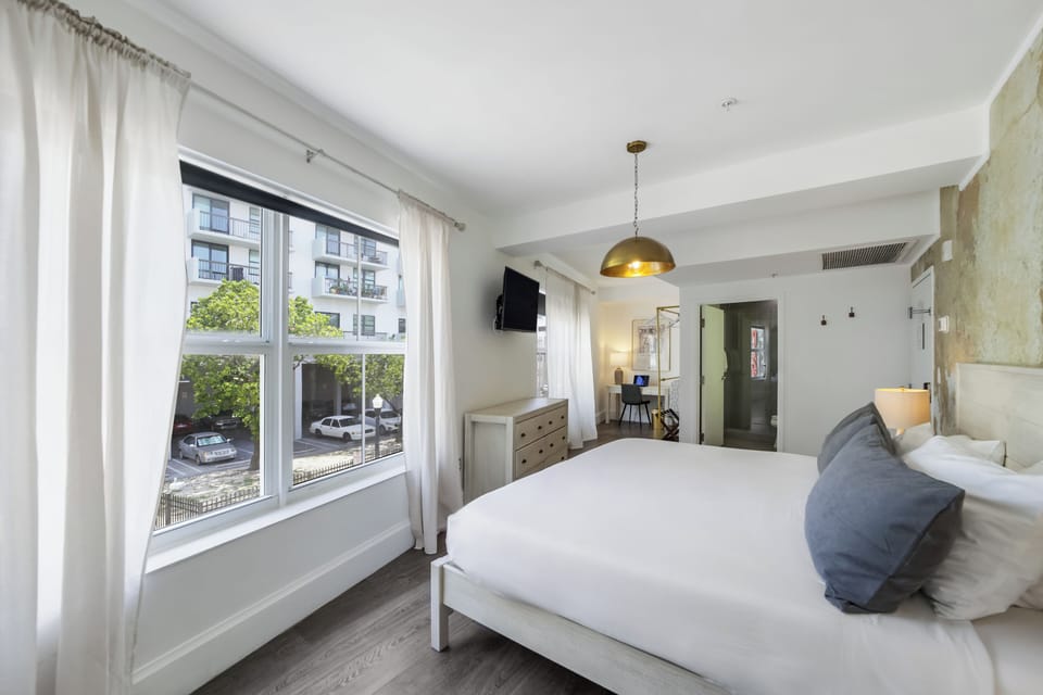 Suite, 1 King Bed (Self check-in) | Pillowtop beds, in-room safe, desk, laptop workspace