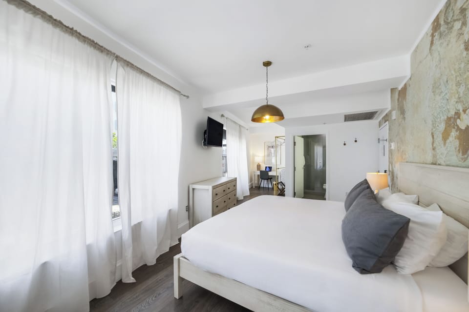 Suite, 1 King Bed (Self check-in) | Pillowtop beds, in-room safe, desk, laptop workspace