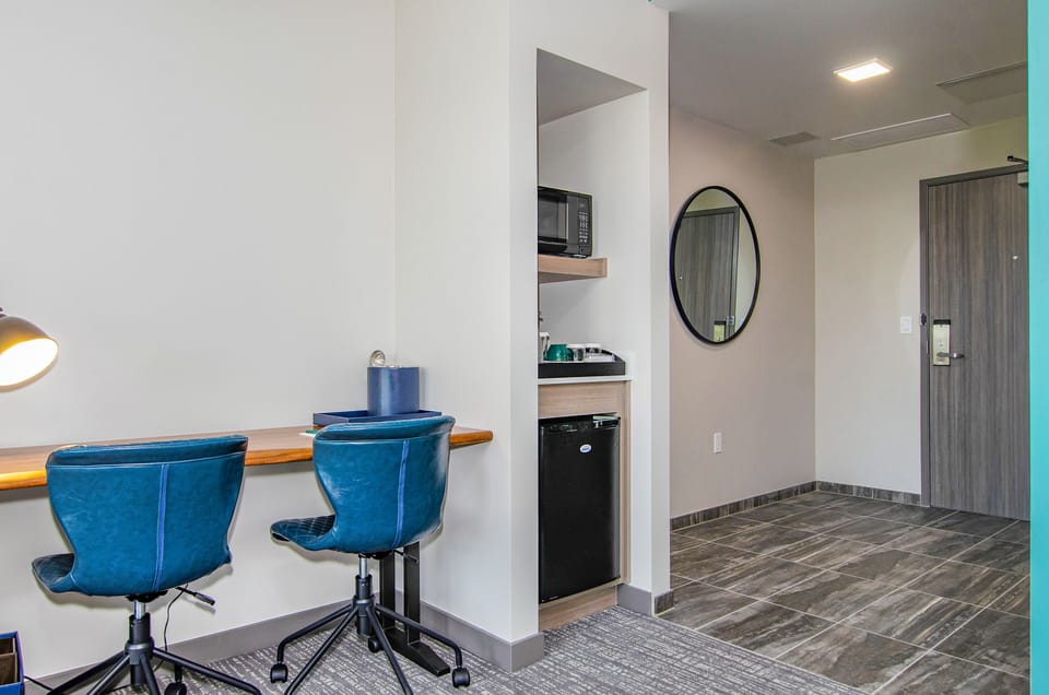 Premium bedding, memory foam beds, desk, laptop workspace