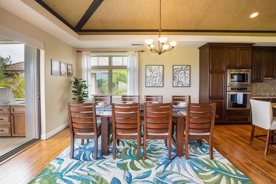 Bright dining space with island-inspired design and ample seating for gathering.