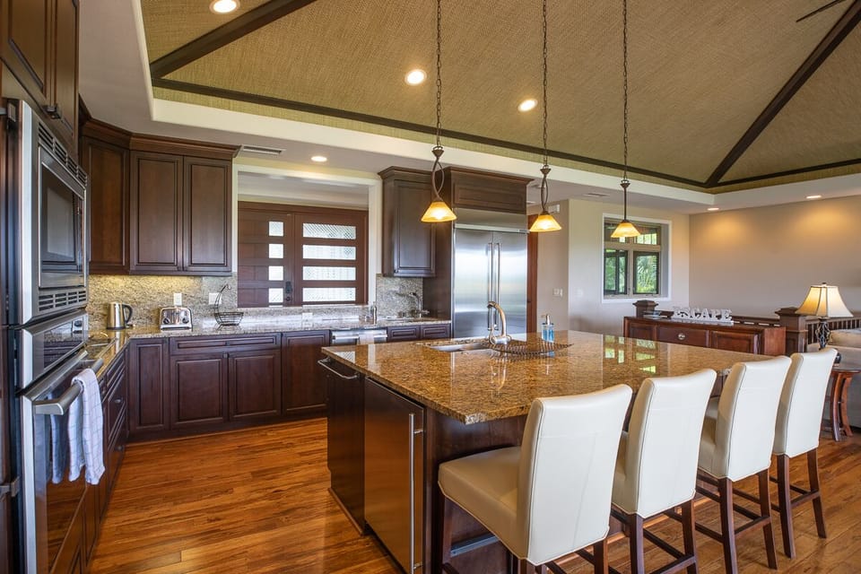 Modern kitchen with high-end appliances and a spacious island for gathering.