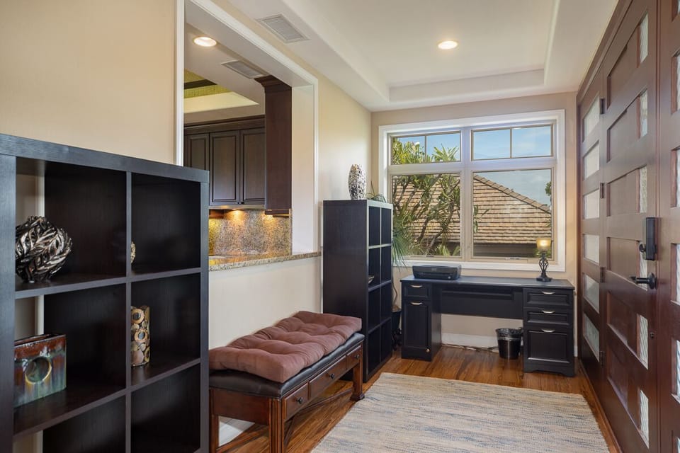 Convenient desk area just off the kitchen for remote work or trip planning.