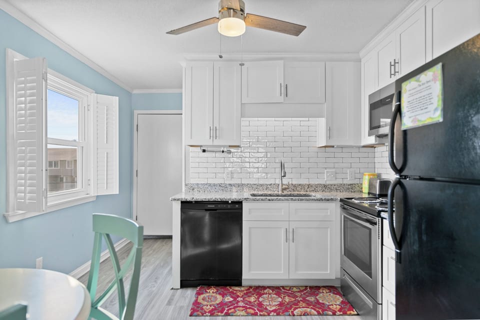 Your bright kitchen features modern appliances and a cozy breakfast nook for morning coffee.