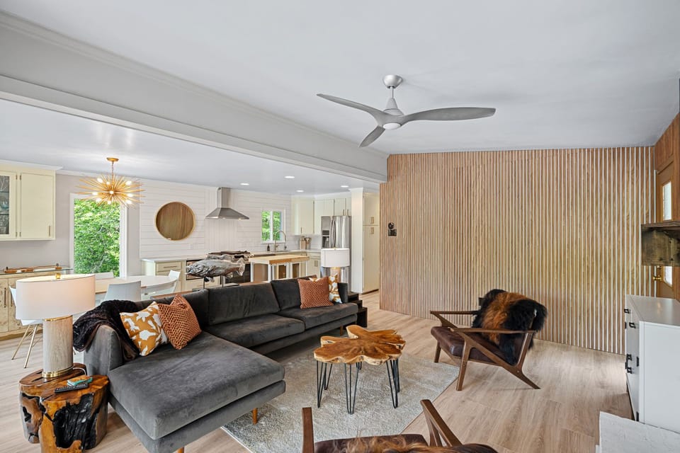 Upper Level Living Room with Tv & deck access.