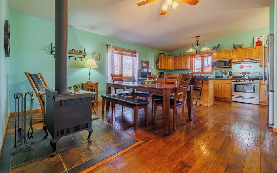 The dining room also has space to curl up with a good book around the fireplace