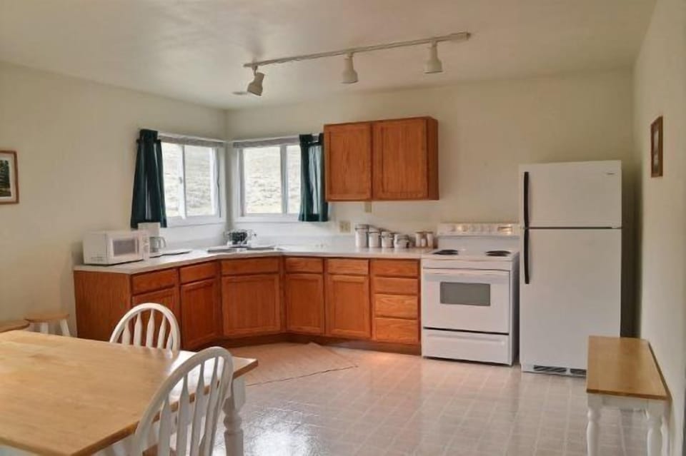 Fully equipped kitchen is large and open for your group to gather