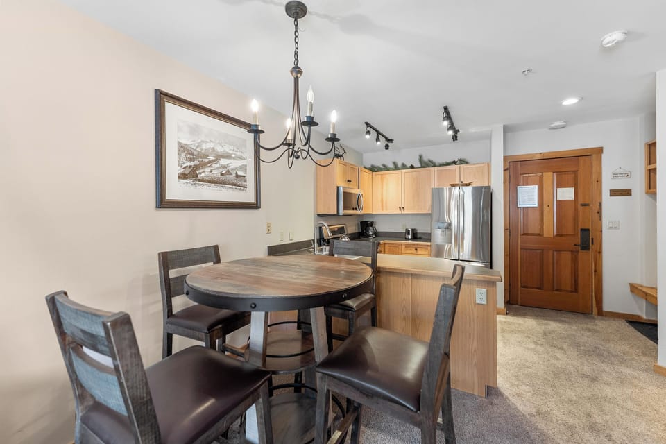 Gather around your elegant dining table for memorable meals, with a fully equipped kitchen ready for your culinary adventures.
