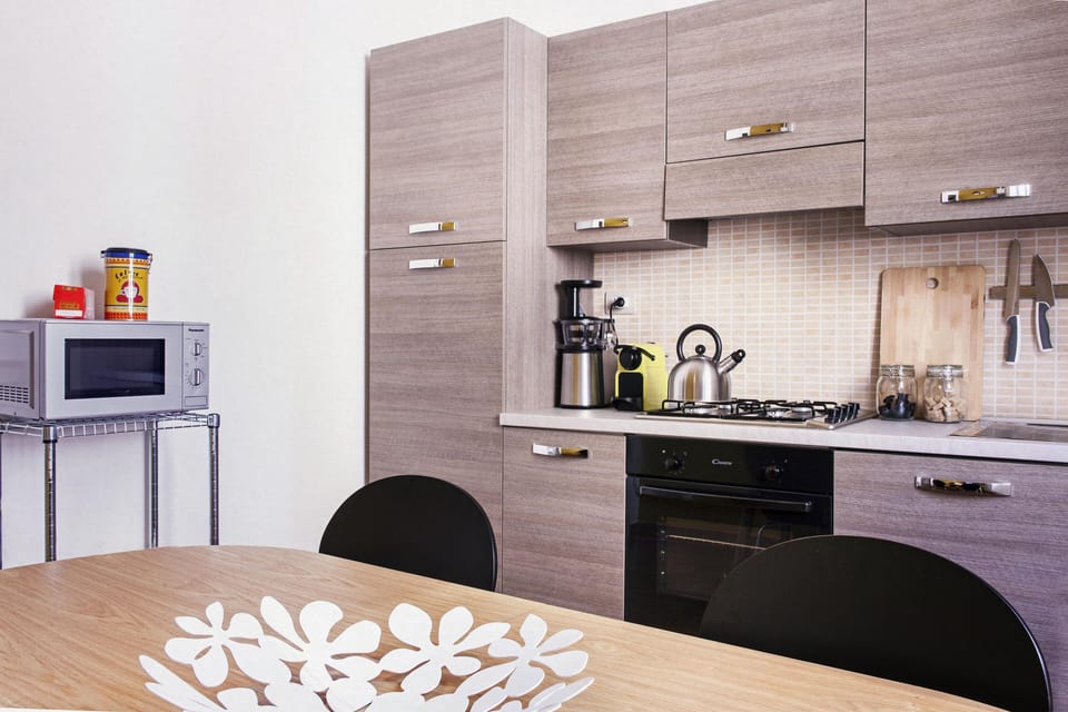 Apartment, 2 Bedrooms | Private kitchen | Full-size fridge, microwave, oven, stovetop