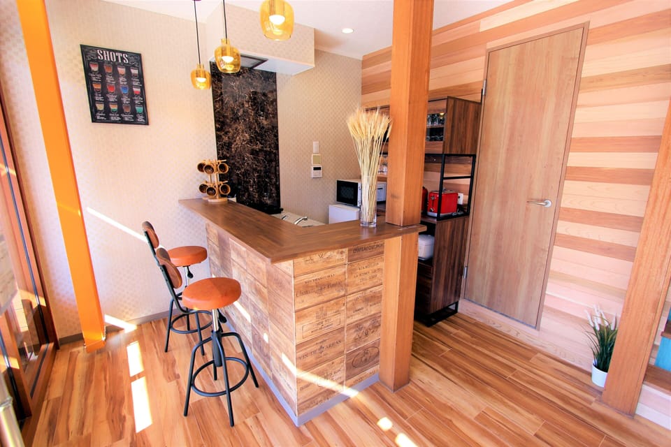 Basic Condo | Living area | 42-inch flat-screen TV with cable channels, TV, video-game console