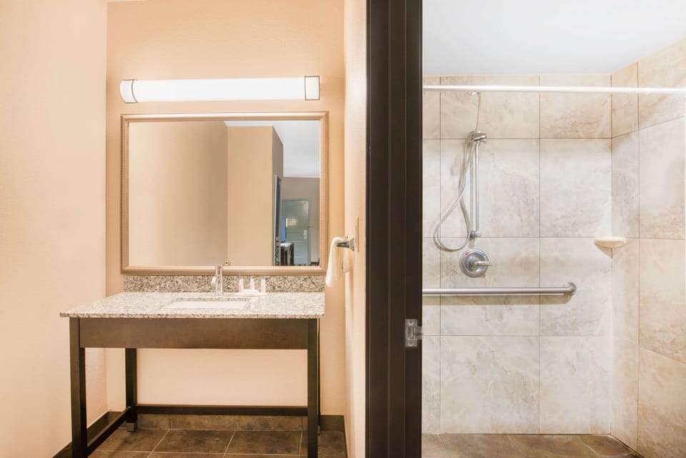 Combined shower/tub, deep soaking tub, free toiletries, hair dryer