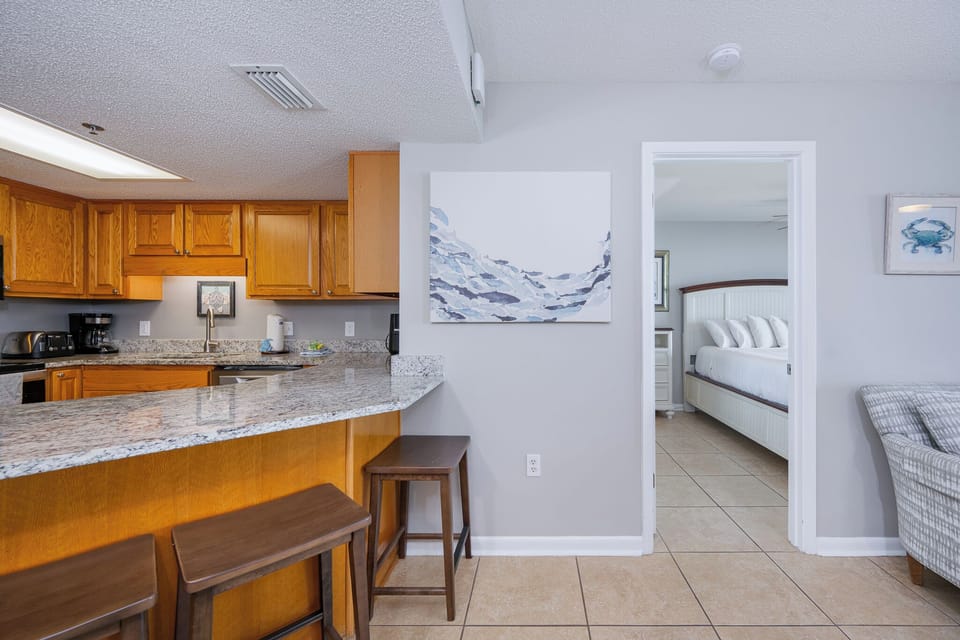 Craft your morning coffee and gather around the bar stools, enjoying casual conversations before adventures on the coast