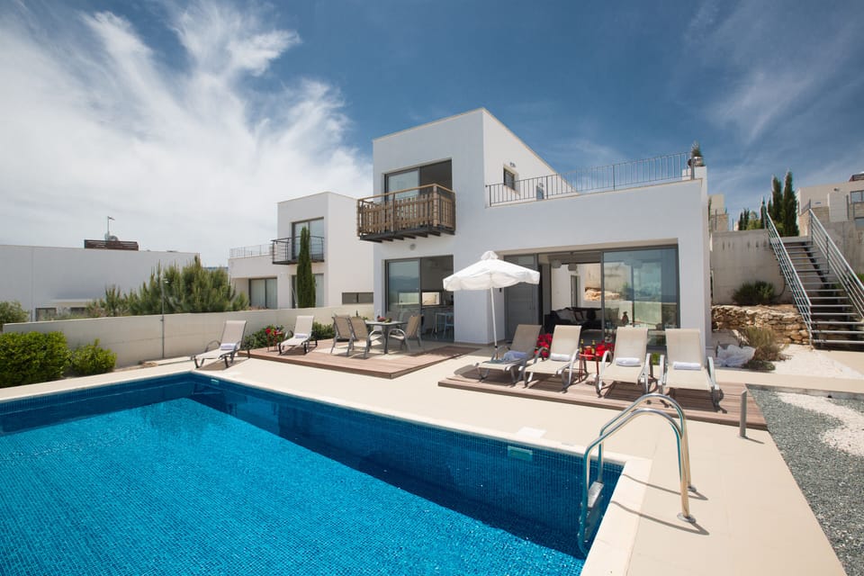 Garden with barbecue, seating area, sun loungers and private pool