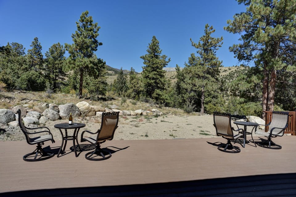 Cottage patio with tables and chairs
