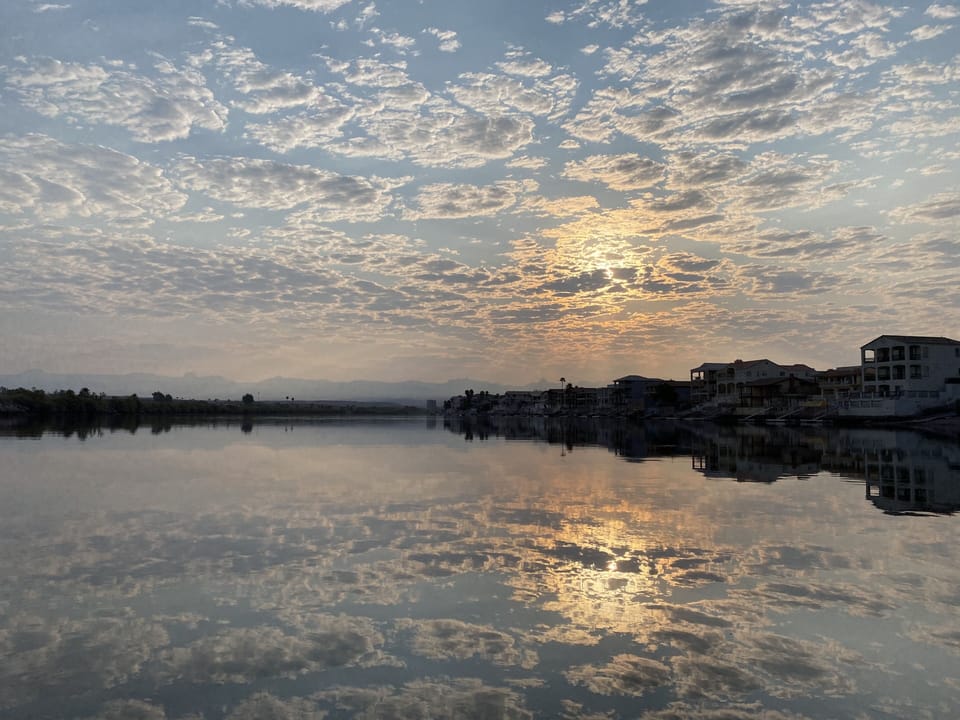 sunrise over the water. 