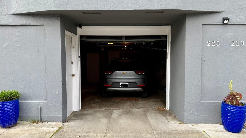 Private garage(rare for SF!)fits one large vehicle with driveway space for a 2nd