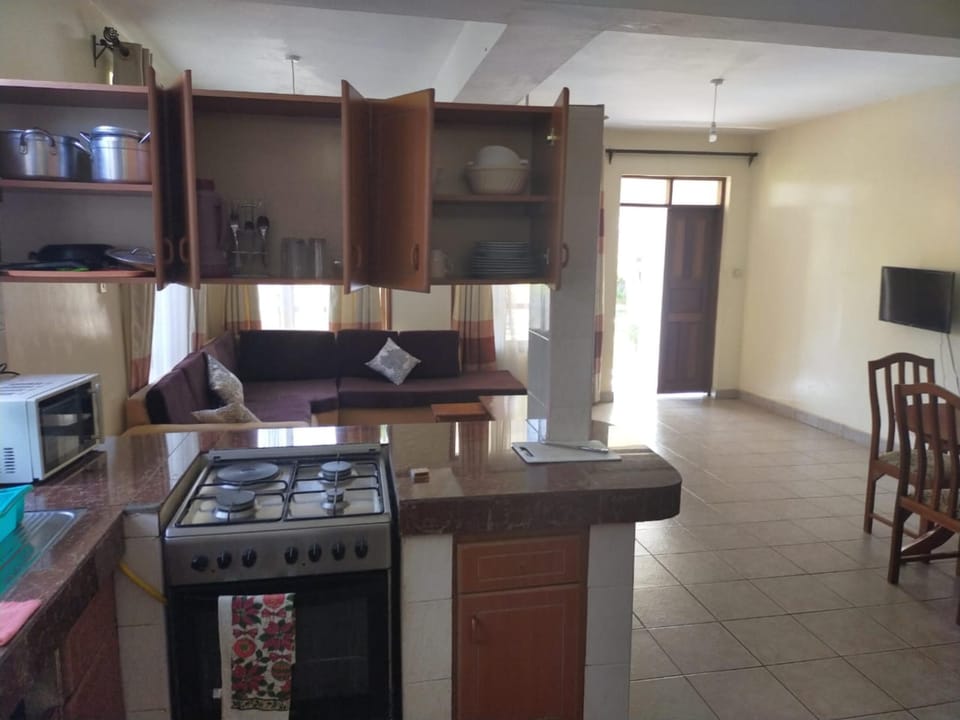 Full-size fridge, microwave, dining tables