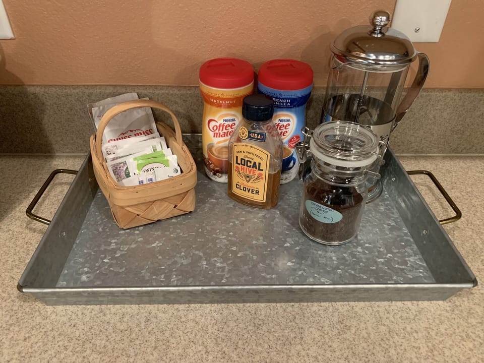 Coffee maker, French press, and electric kettle are available for guest use.